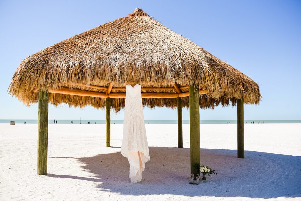 A beautiful wedding dress at the beach